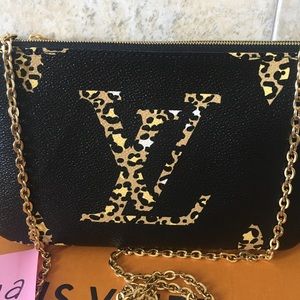 Louis Vuitton Animal Print Pouchette crossbody bag